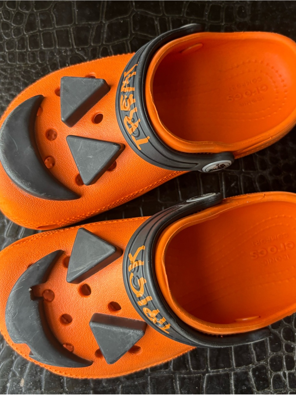 CROCS Kids Orange Clog Sandals with Black Smile Accents